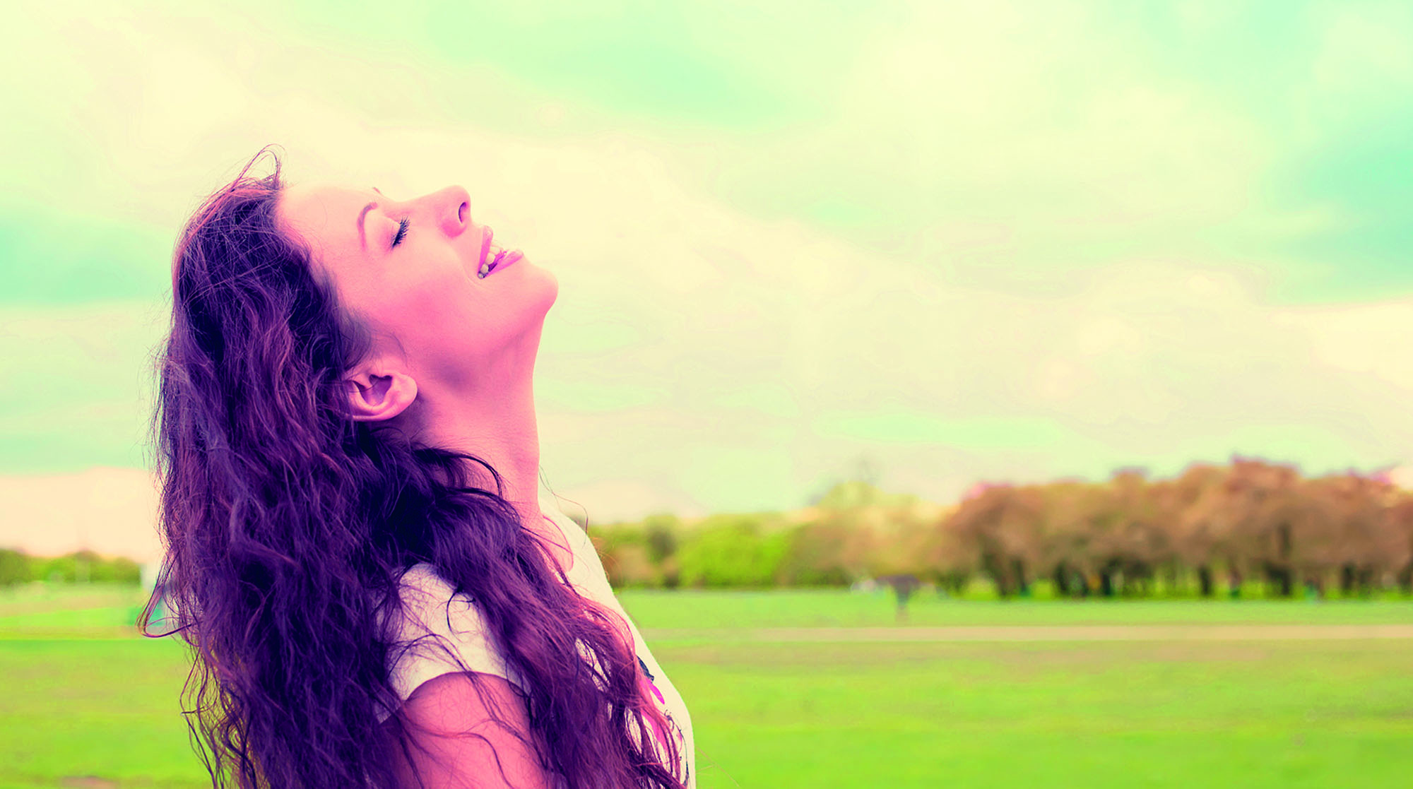 young woman enjoying nature and being alive