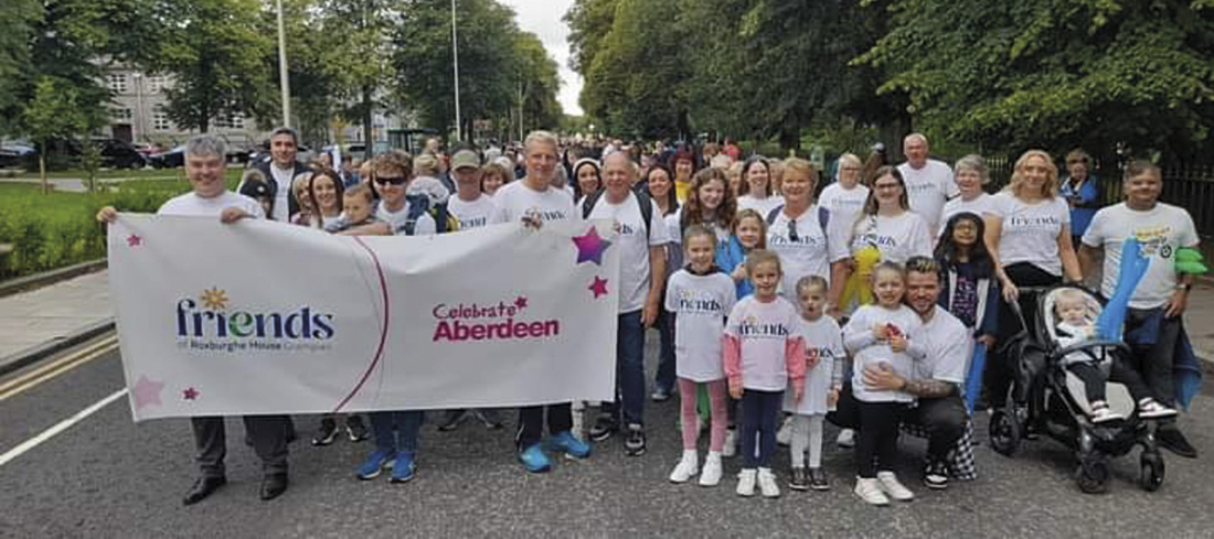 a group of runners raising funds for Friends of Roxburghe House Grampian